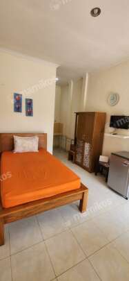 Room with a bed and a desk